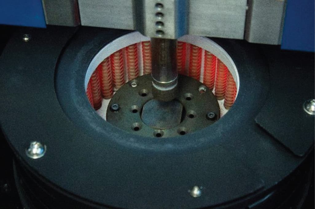 Steel sample mounted inside the NANOVEA T2000 high temperature chamber for Brinell hardness testing