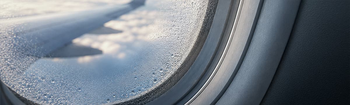 Transparent polymer application exposed to humidity and condensation, illustrating moisture-sensitive material performance